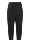 Issey Miyake Pleated Tapered Trousers In Black