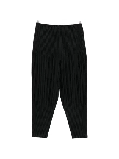 Issey Miyake Pleated Tapered Trousers In Black