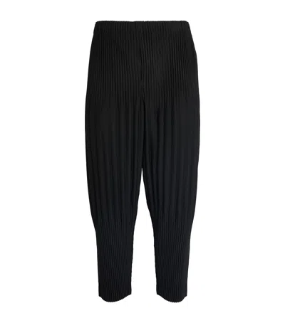 ISSEY MIYAKE PLEATED TAPERED TROUSERS