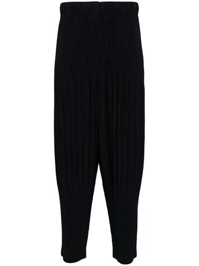 ISSEY MIYAKE PLEATED TAPERED TROUSERS