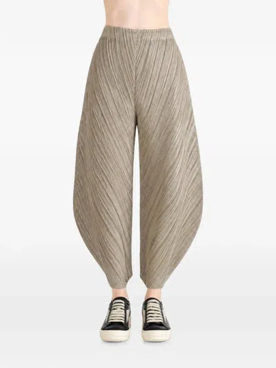 Issey Miyake Pleated Tapered Trousers In Neutral