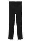 Shop Issey Miyake Pleated Trousers In Black