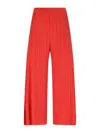 Issey Miyake Pleated Cropped Trousers In Orange