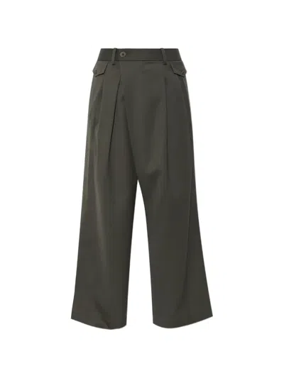 Issey Miyake Pleated Wrap-front Trousers In Green