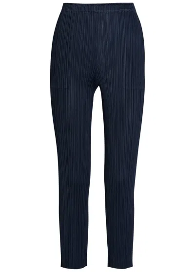 Issey Miyake Pleats Please Pleated Tapered-leg Woven Trousers In Blue