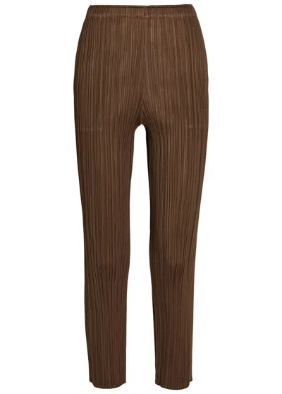 Issey Miyake Pleats Please Pleated Tapered-leg Woven Trousers In Brown