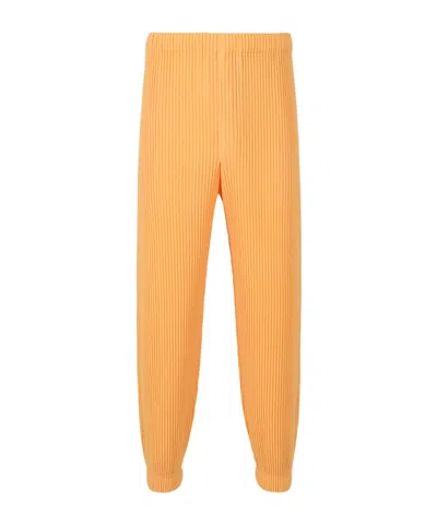 Issey Miyake Plissé Tapered Trousers In Orange