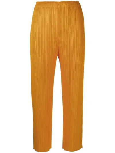 Issey Miyake Plissé Cropped Trousers In Orange