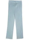 Issey Miyake Plissé-effect Slim-cut Trousers In Blue