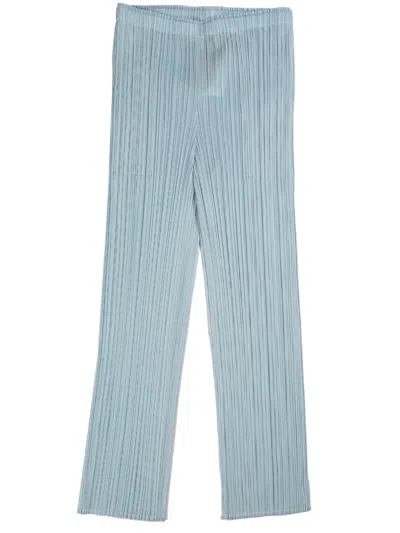 Issey Miyake Plissé-effect Slim-cut Trousers In Blue