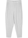 Issey Miyake Basic Pleated Tapered-leg Knitted Trousers In Grey