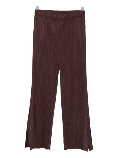 Issey Miyake Plissé Split-hem Trousers In Brown