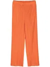Issey Miyake Plissé Trousers In Orange