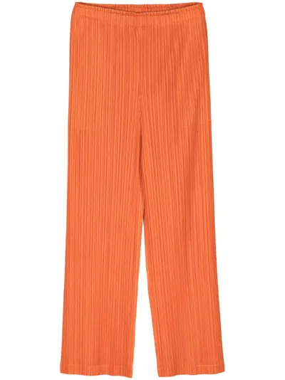 Issey Miyake Plissé Trousers In Orange