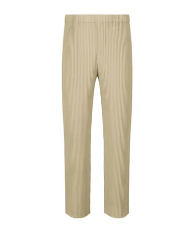 Issey Miyake Tapered-leg Plissé Trousers In Nude