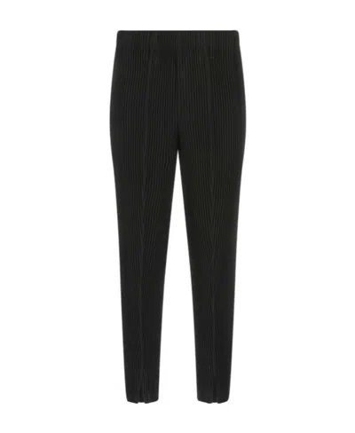 Issey Miyake Tapered Plisse Trousers In Black