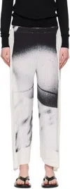 Issey Miyake Womens Shadow Study Pleats Asymmetric-cuffs Knitted Trousers In Multi