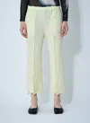 Issey Miyake Women Wrinkled And Twisted Pants In Yellow