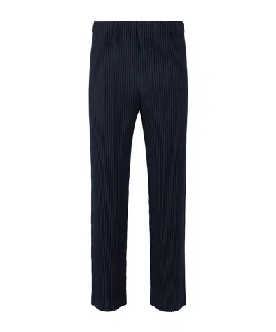 ISSEY MIYAKE HOMME PLISSÉ ISSEY MIYAKE PLEATED TAPERED-LEG PANTS