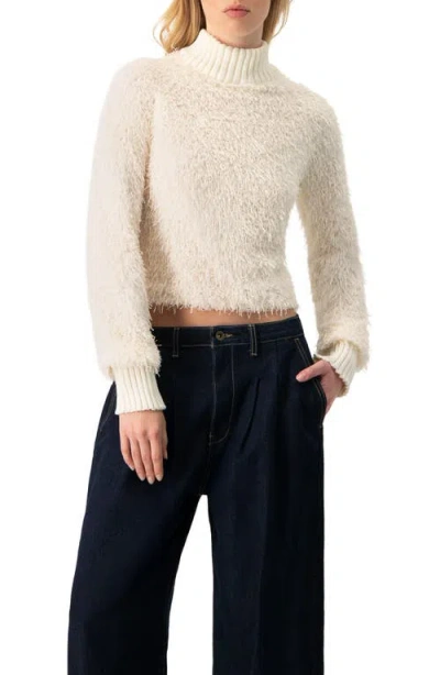 Ivonne Long Sleeve Fringe Blouse With Ribbed High Neck In Neutral