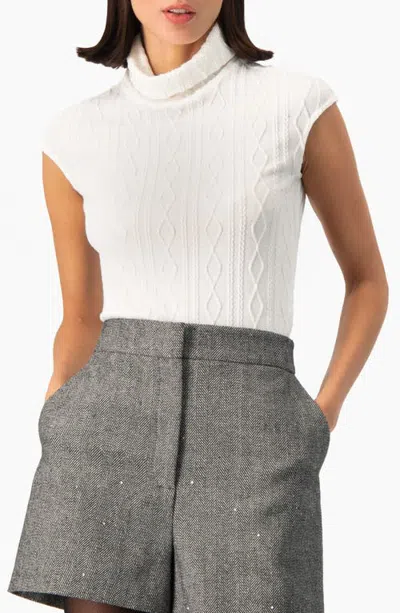 Ivonne Sleeveless Cable Knit Turtleneck Top In White