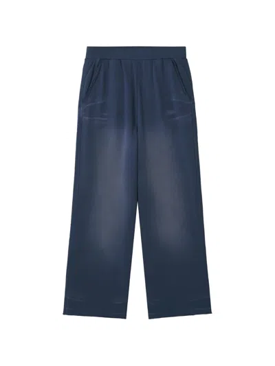 Izzue Faded Track Pants In Animal Print
