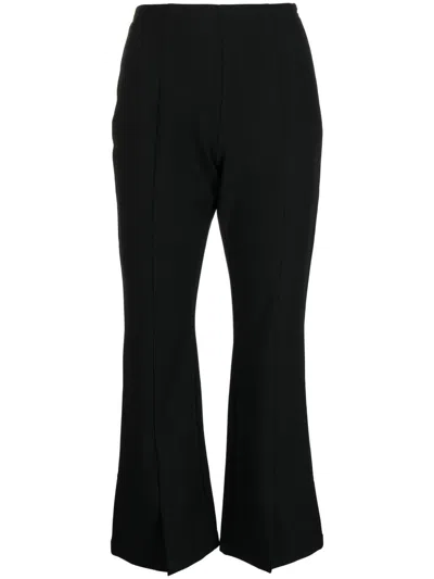 Izzue Flared Rear Logo-patch Trousers In Black