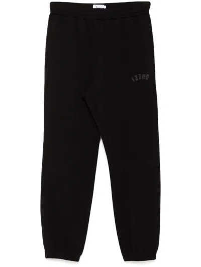 Izzue Logo-patch Pants In Black