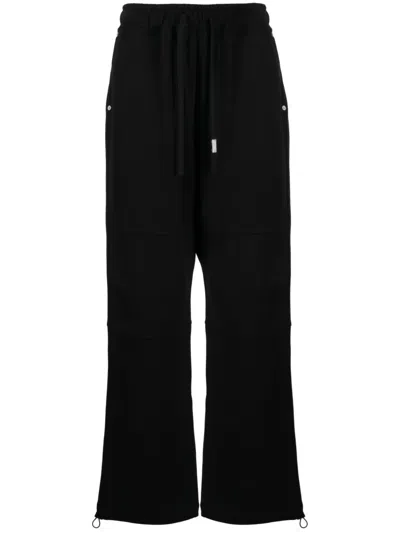 Izzue Logo-patch Straight-leg Pants In Schwarz