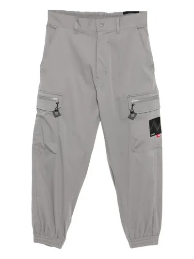 Izzue Logo-patched Trousers In Animal Print