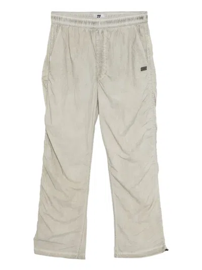 Izzue Logo-patched Trousers In Neutral