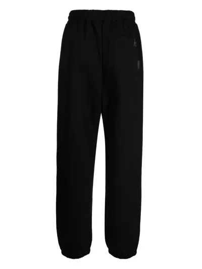 Izzue Logo-embroidered Slip-on Track Pants In Schwarz