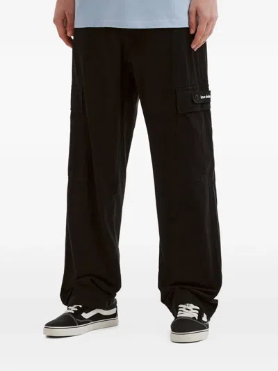 Izzue Logo-patch Trousers In Brown