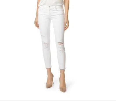 J BRAND LOW RISE DISTRESSED CROP SKINNY JEANS IN WHITE