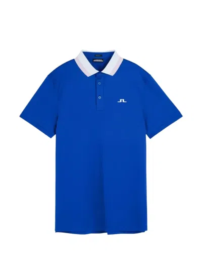 J. Lindeberg Logo-embroidered Colour-block Polo Shirt In Blue