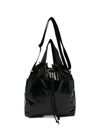 Jack Gomme Glossy Drawstring Shoulder Bag In Pink