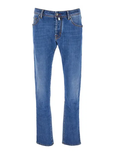 JACOB COHEN BLUE JEANS WITH LOGO PATCH ON THE BACK