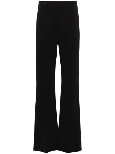 JACQUEMUS APOLLO FLARED TROUSERS