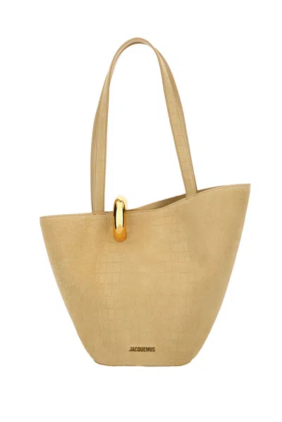 Jacquemus Asymmetric Beige Cocco Print Bucket Bag With Gold-tone Hardware In Nude