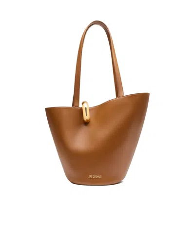 Jacquemus Asymmetrical Shoulder Bag In Brown