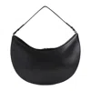 Jacquemus Le Petit Calisso Rond Embellished Leather Clutch In Black