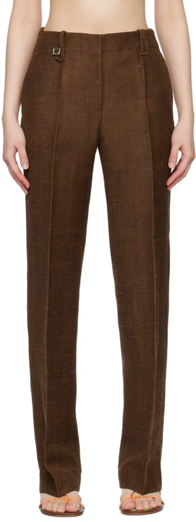 Jacquemus Stitch-detail Flared Trousers In 880 Dark Brown