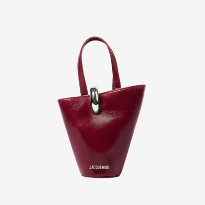 JACQUEMUS BURGUNDY BAMBOLA SMALL BUCKET BAG