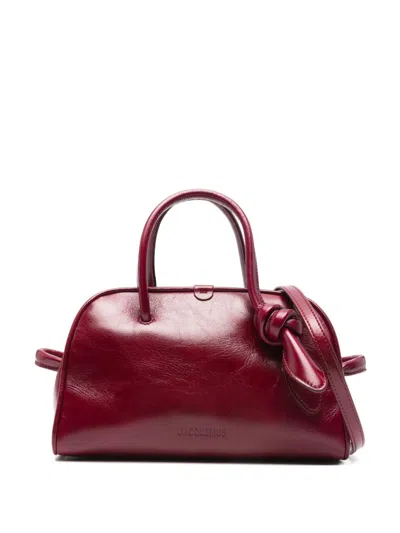 JACQUEMUS WOMEN BURGUNDY TURISMO SMALL DUFFLE BAG, ONESIZE LUXURY DUFFLE BAGS FOR WOMEN DARVEYS