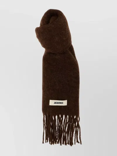 Jacquemus Carro Scarf With Soft Texture And Fringed Edges In Brown