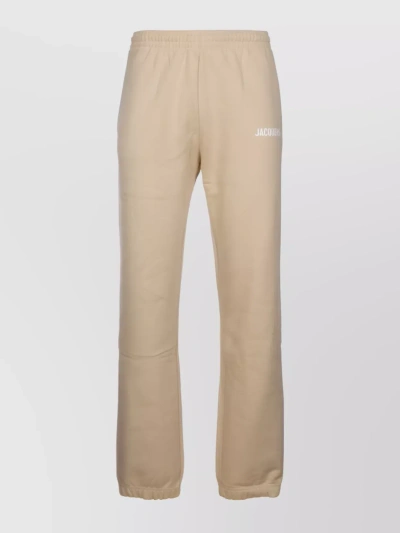 Jacquemus Elastic Waistband Cuffed Trousers In Cream