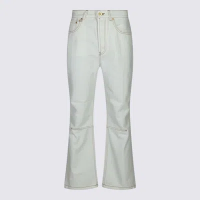 Jacquemus Cropped Flared Jeans In Off-white/tabac