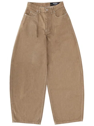 Jacquemus Denim De.-nimes Ovalo Trousers In Brown