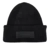 Jacquemus Knitted Beanie Hat With Gros-grain Logo In Black