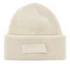 Jacquemus Knitted Beanie Hat With Gros-grain Logo In Neutral